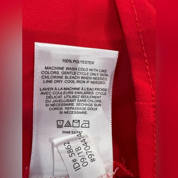 Gently worn Express red long-sleeve blouse with cut-out buttoned sleeves - Picture 10 of 12